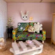 Miniature dollhouse floral sofa